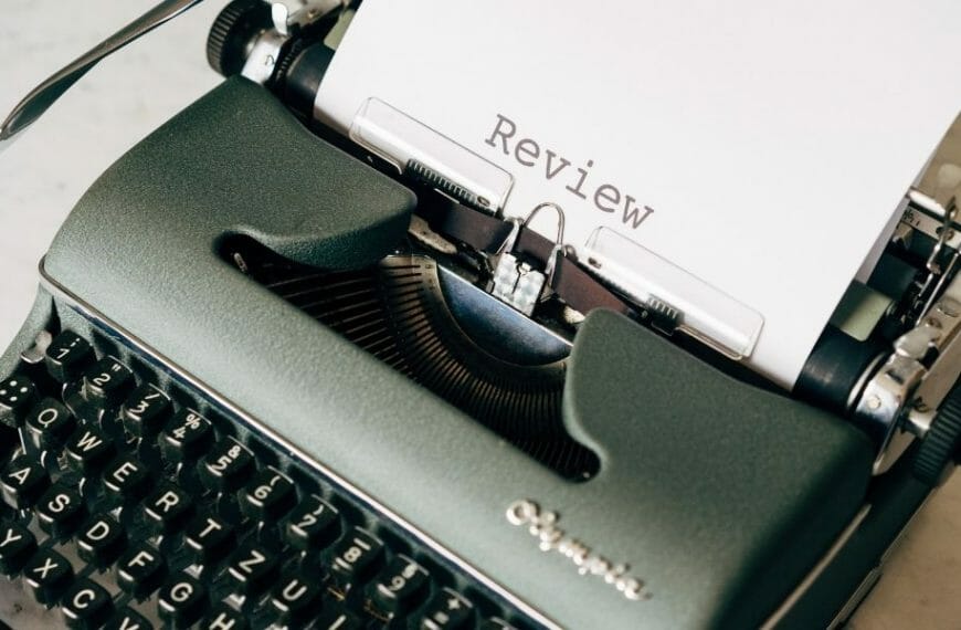 Typewriter with the word "review" typed on a piece of paper