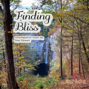 Colorful autumn trees frame a tall waterfall to form the cover for "Finding Bliss" contemplative music by Stan Stewart.