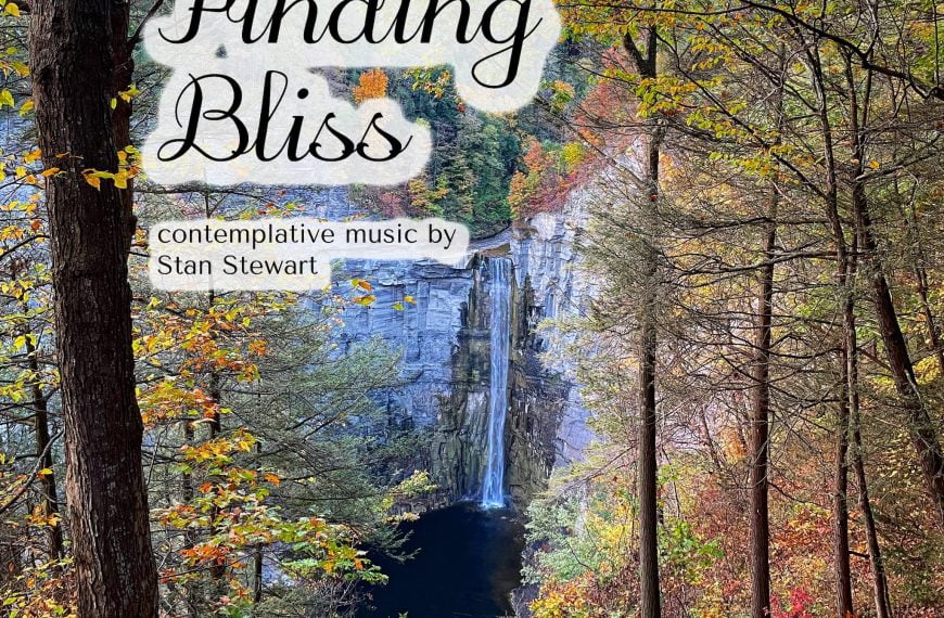 Colorful autumn trees frame a tall waterfall to form the cover for "Finding Bliss" contemplative music by Stan Stewart.
