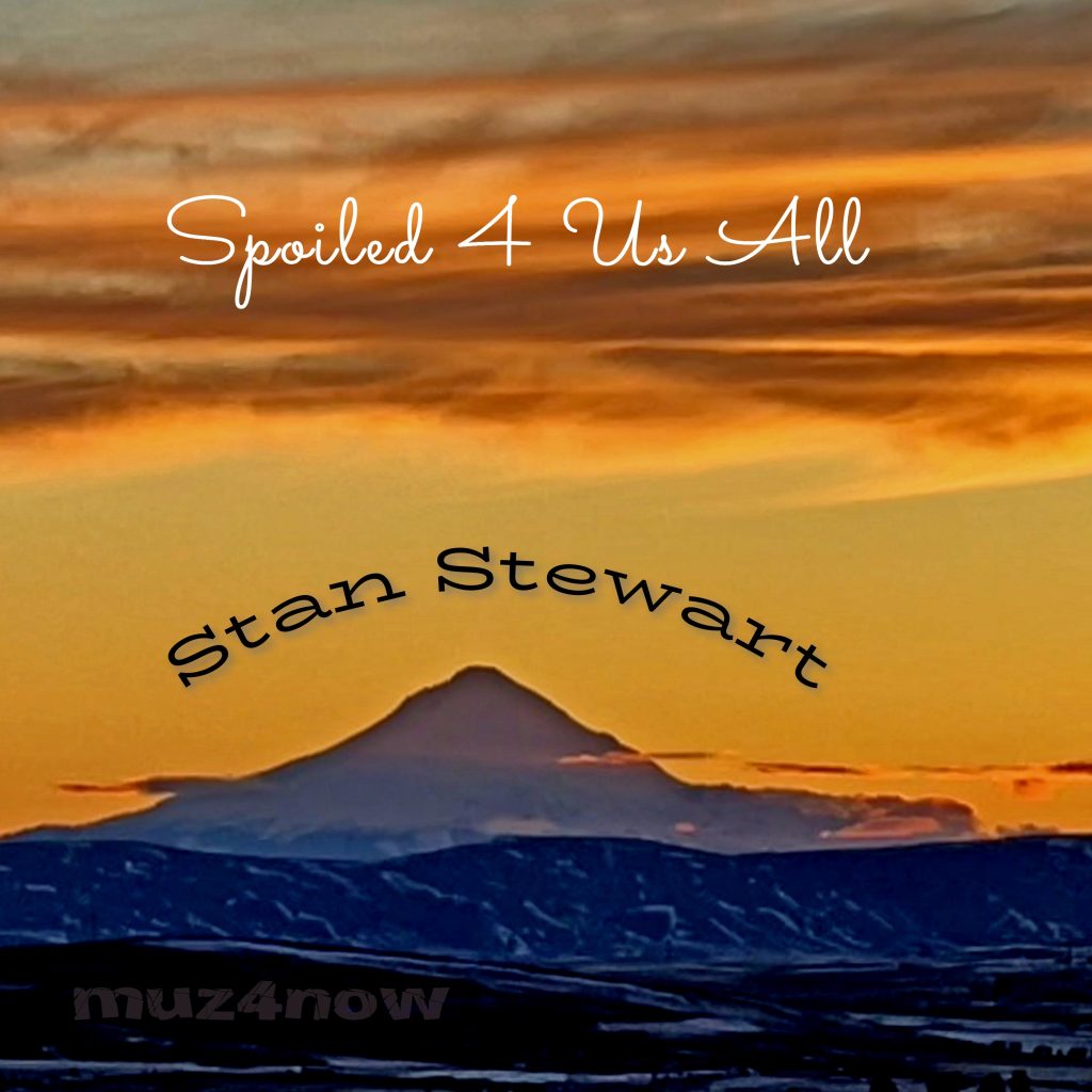 Mount Hood with a rather bright orange sky and clouds forms the cover of "Spoiled 4 Us All" by Stan Stewart.
