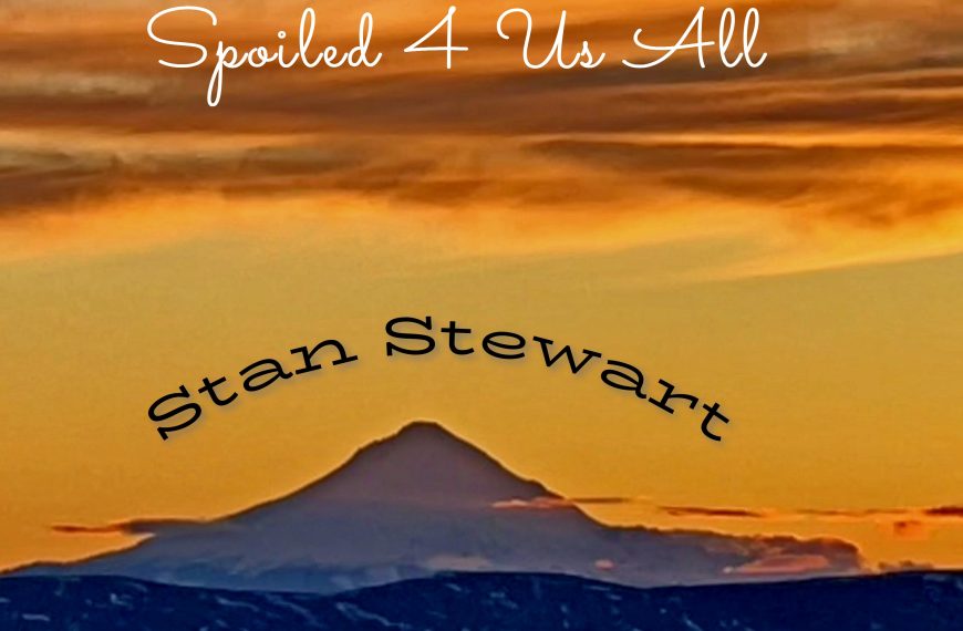 Mount Hood with a rather bright orange sky and clouds forms the cover of "Spoiled 4 Us All" by Stan Stewart.