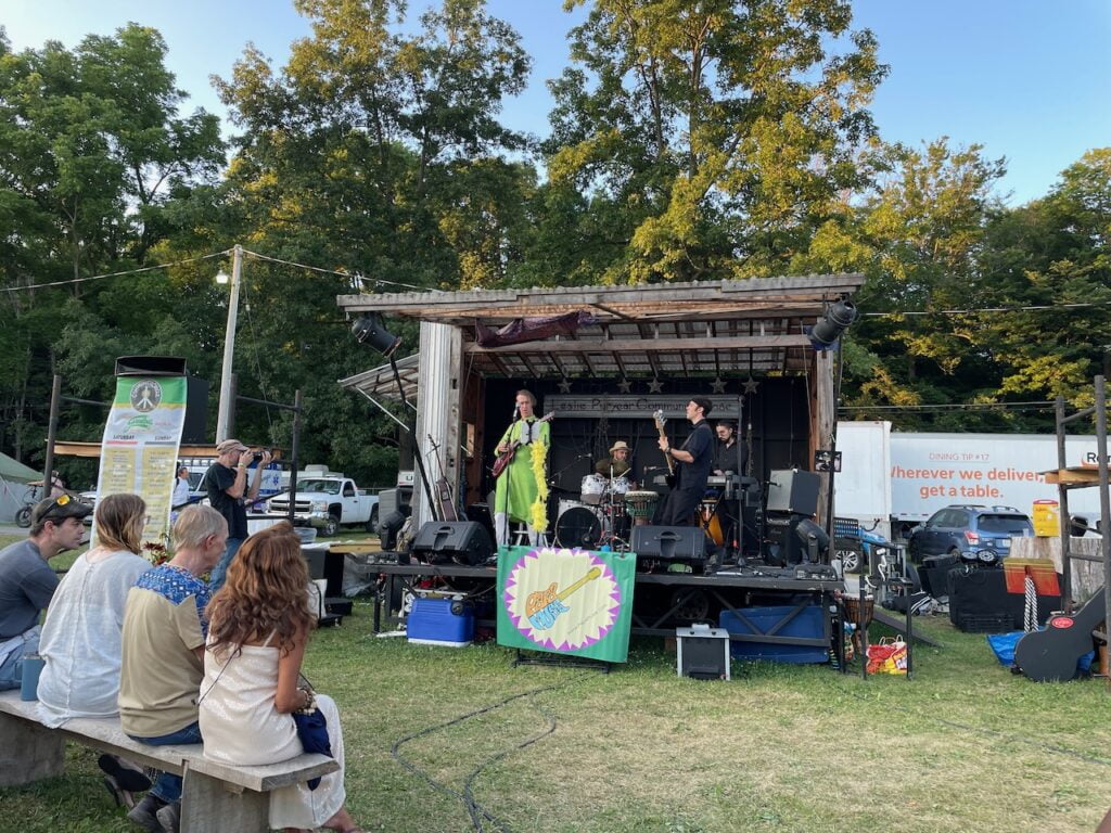 Papa Muse plays a set at the small Community Stage at Grassroots music festival.