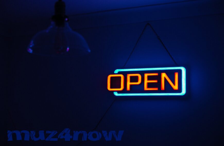 A neon sign says "OPEN"