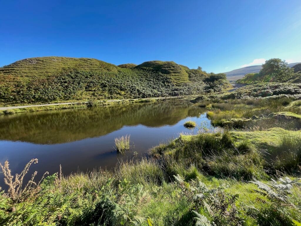 The pond at Fairy Glen in the Scottish Highlands. The hills look like they were sculpted by hands.