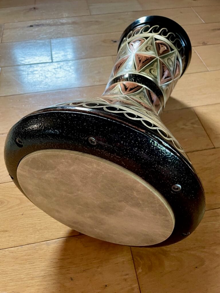 A darbuka with decorative copper base.