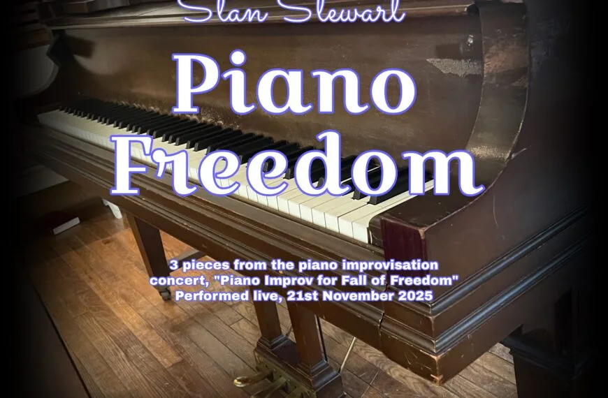 A grand piano keyboard is the photo behind the cover of "Piano Freedom" by Stan Stewart.