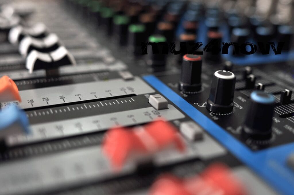 A mixing console in a recording studio represents the remix process.